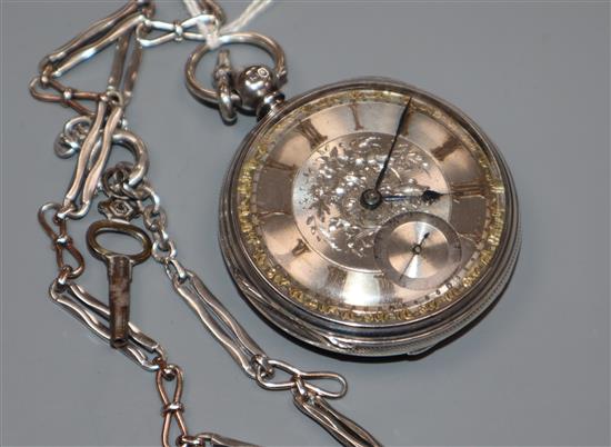 A Victorian silver keywind open face pocket watch, by Sully of Nottingham, on a white metal albert.